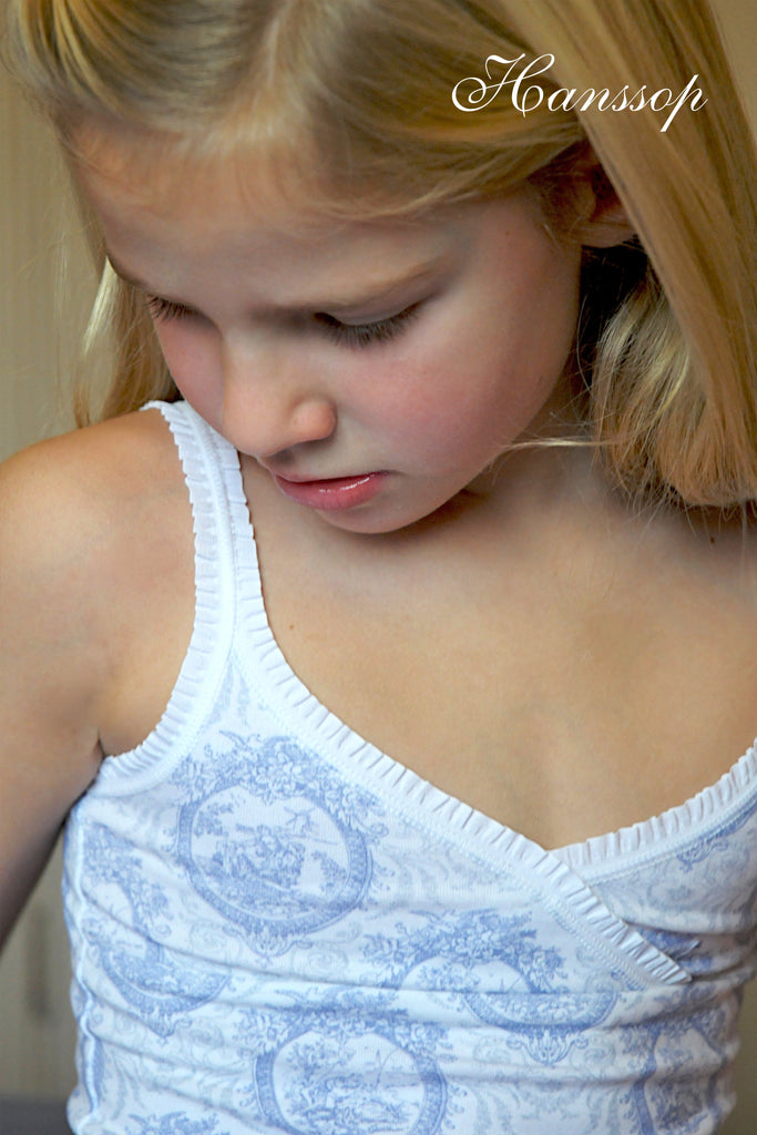 Luxury blue Toile camisole and tanga set for girls made from soft cotton with feminine ruffle edges. Comfortable, elegant and perfect fit. Available in many sizes.