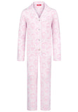 Elegant pink toile girls’ pajamas made from soft cotton with lace edges and pearl buttons. Comfortable, breathable, and perfect for sleeping or relaxing at home.